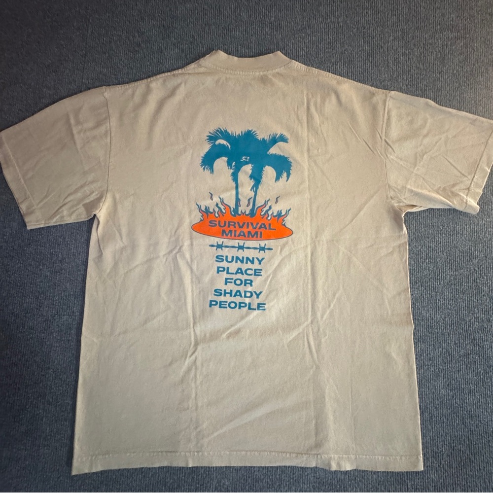 Survival Beige Graphic Tee with Blue and Orange Print